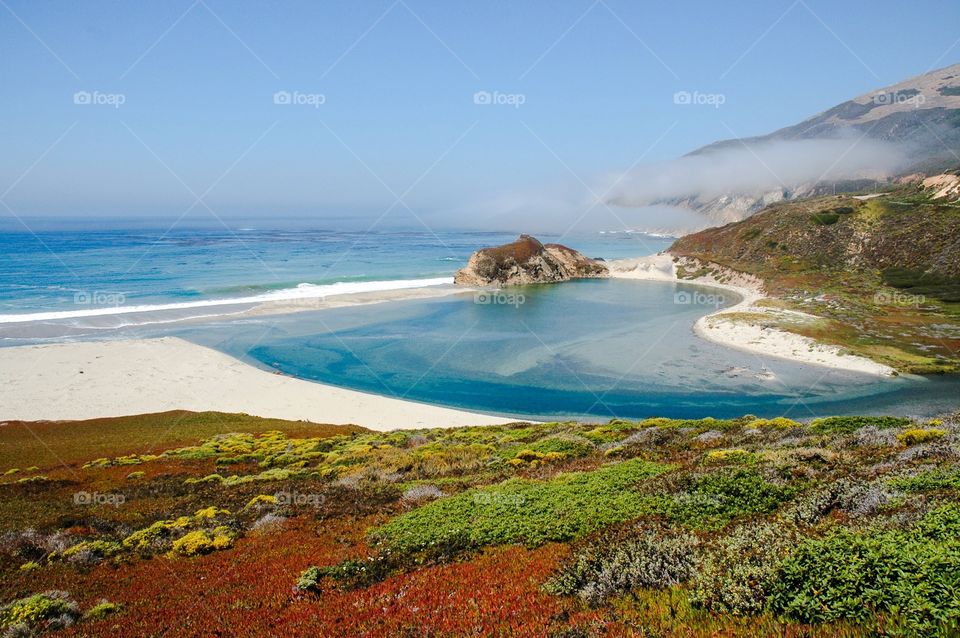 View of The Pacific ocean along Highway one in California.