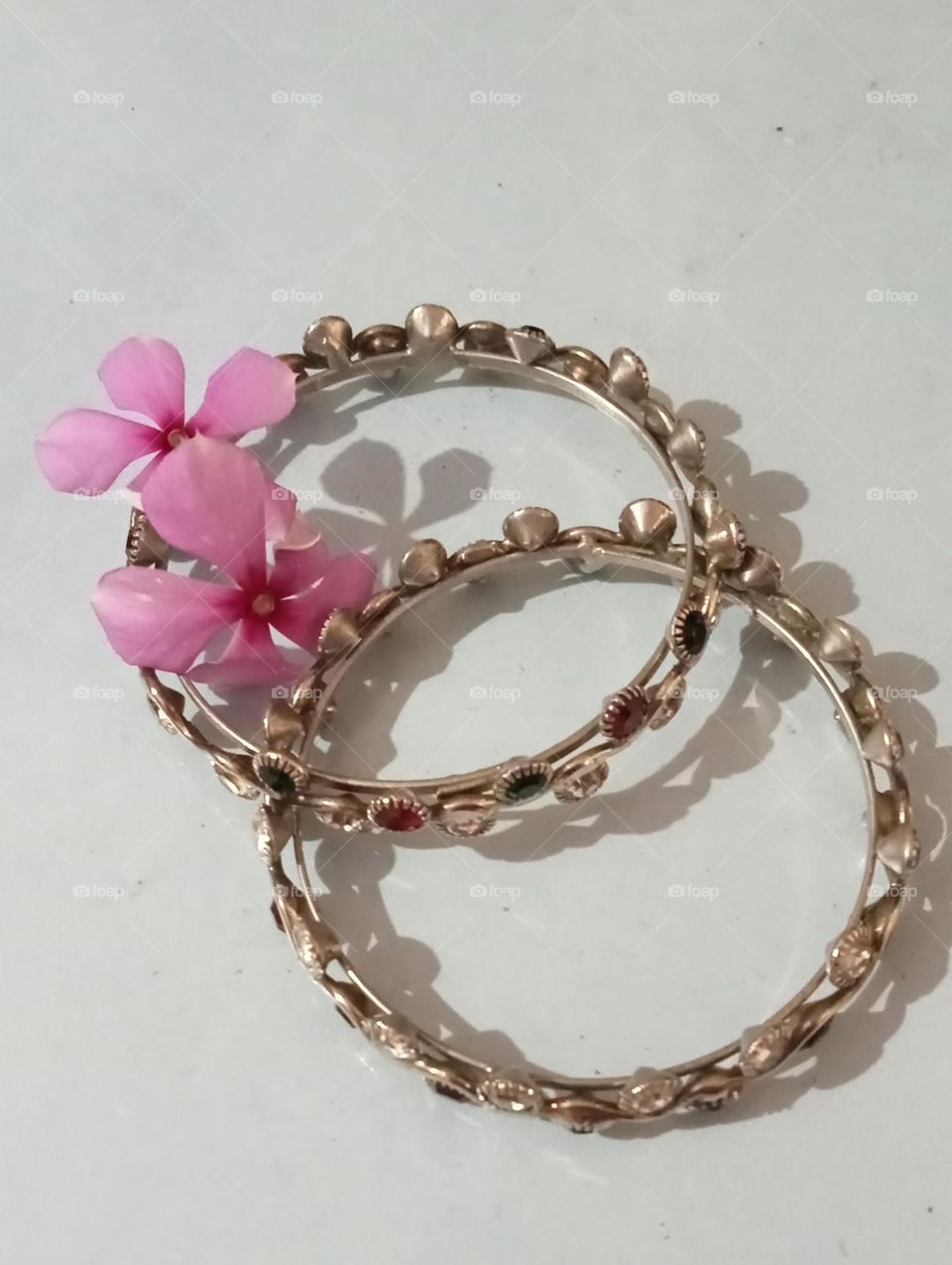 Bangles Is In Geometry Shapes Circle. 🔴⭕ Beautiful 🥰❤️ Bangles decorated with beautiful pink coloured flowers.