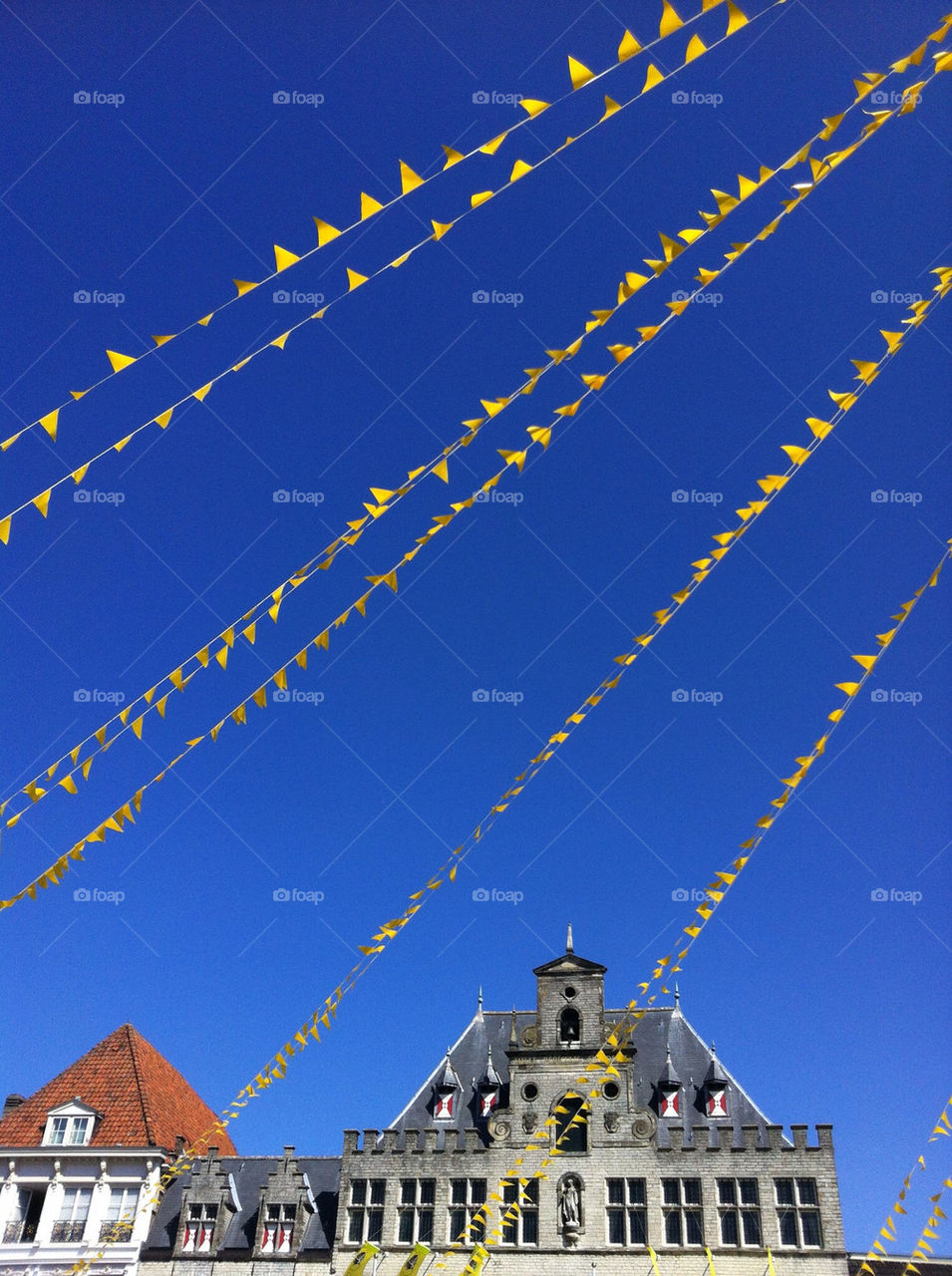 yellow blue architecture flags by hegophoto