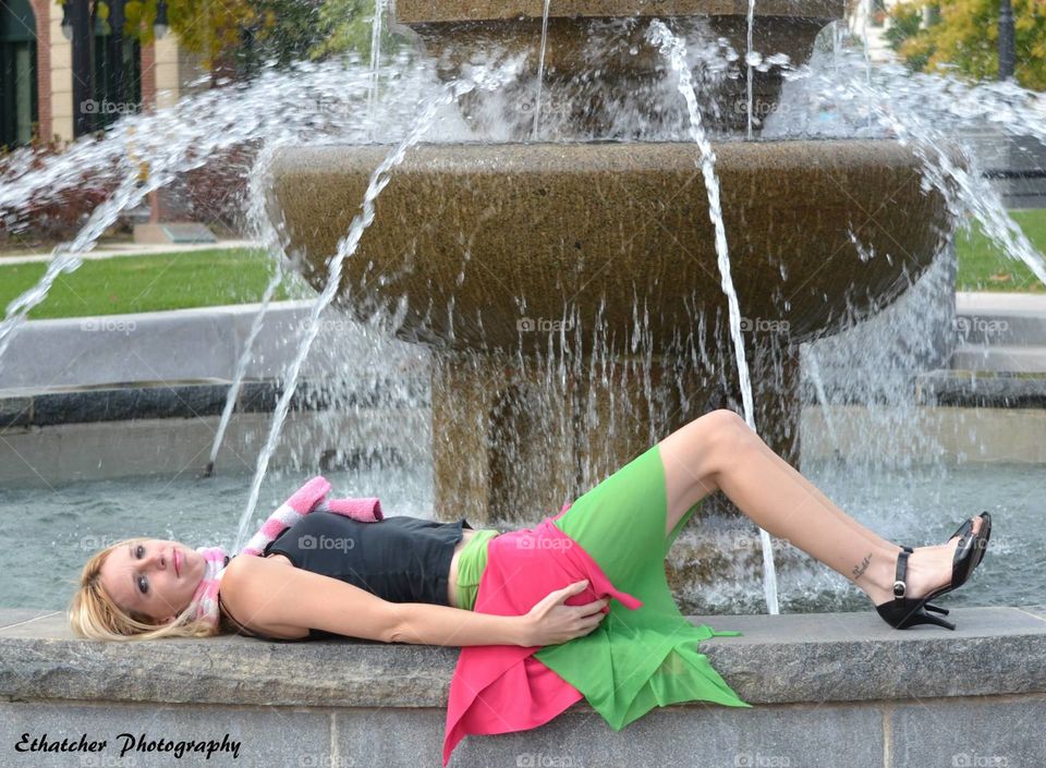 me by a water fountain