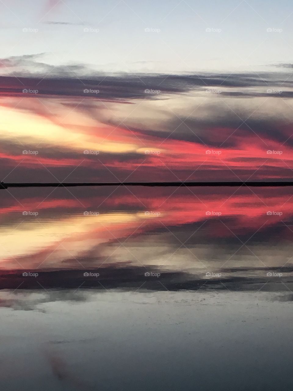 Dramatic sky reflecting in lake