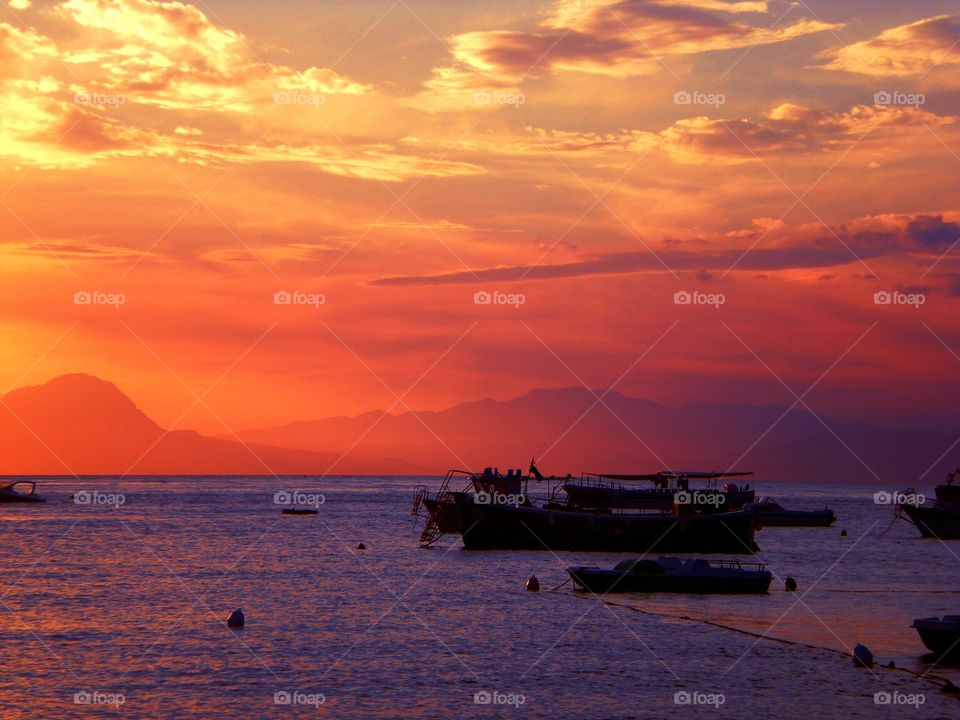 Golden clouds  over the sea. (Praia - Italy ).