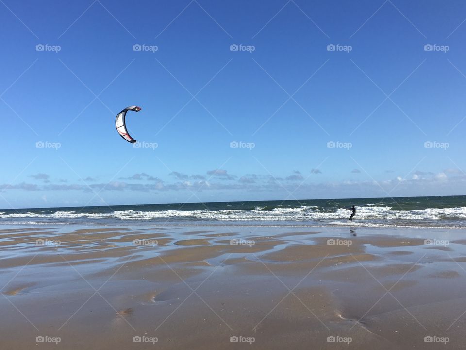 Kitesurfing on beach