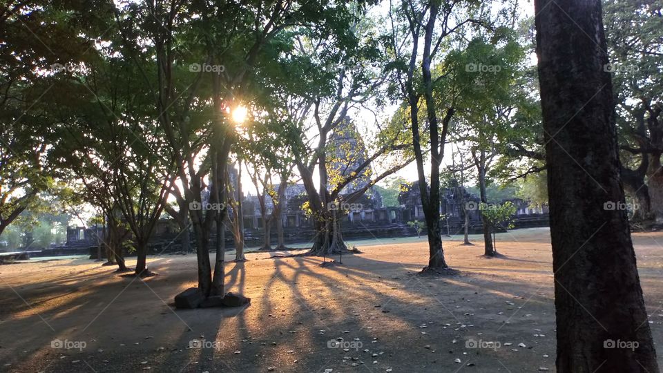Near dusk Phimai historical park
Soothing light and shadows.
Kmer temple in the background the forerunner to Ankor Wat.