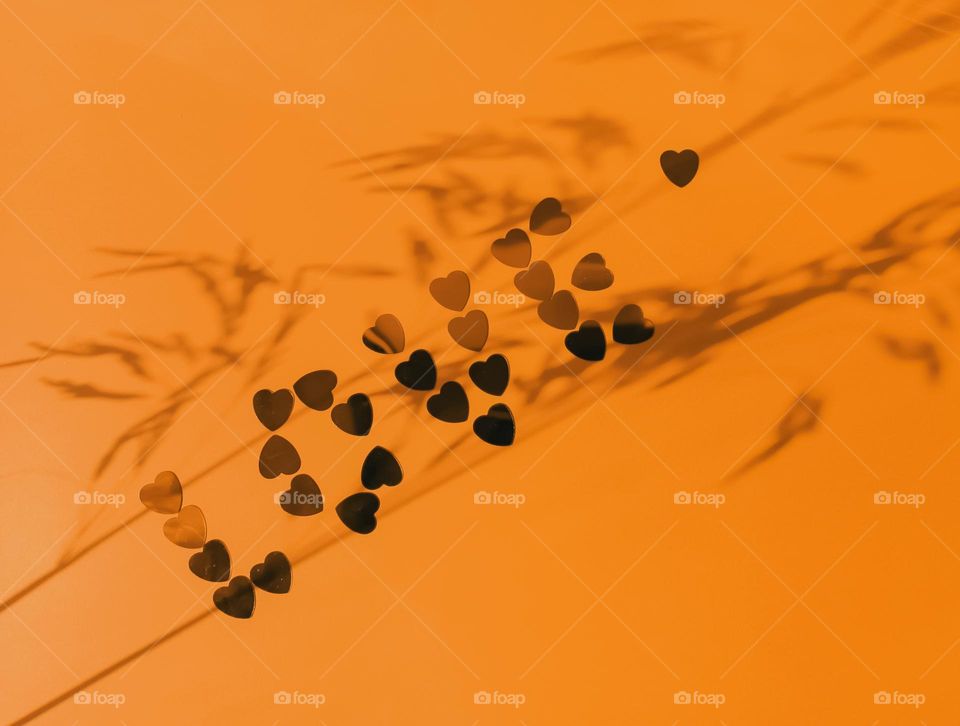 The word love on an orange background