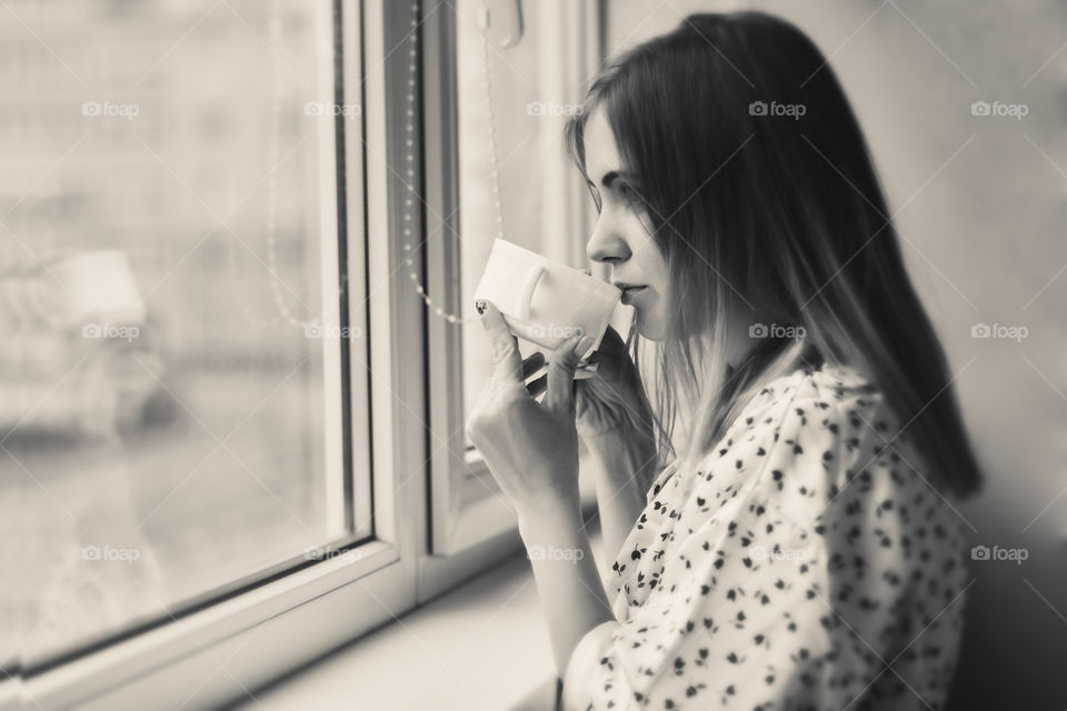 girl is drinking coffee