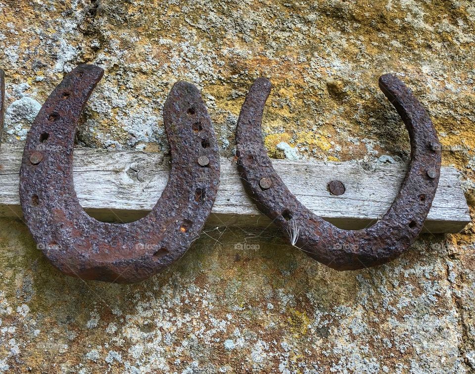 Two horseshoes above a door 