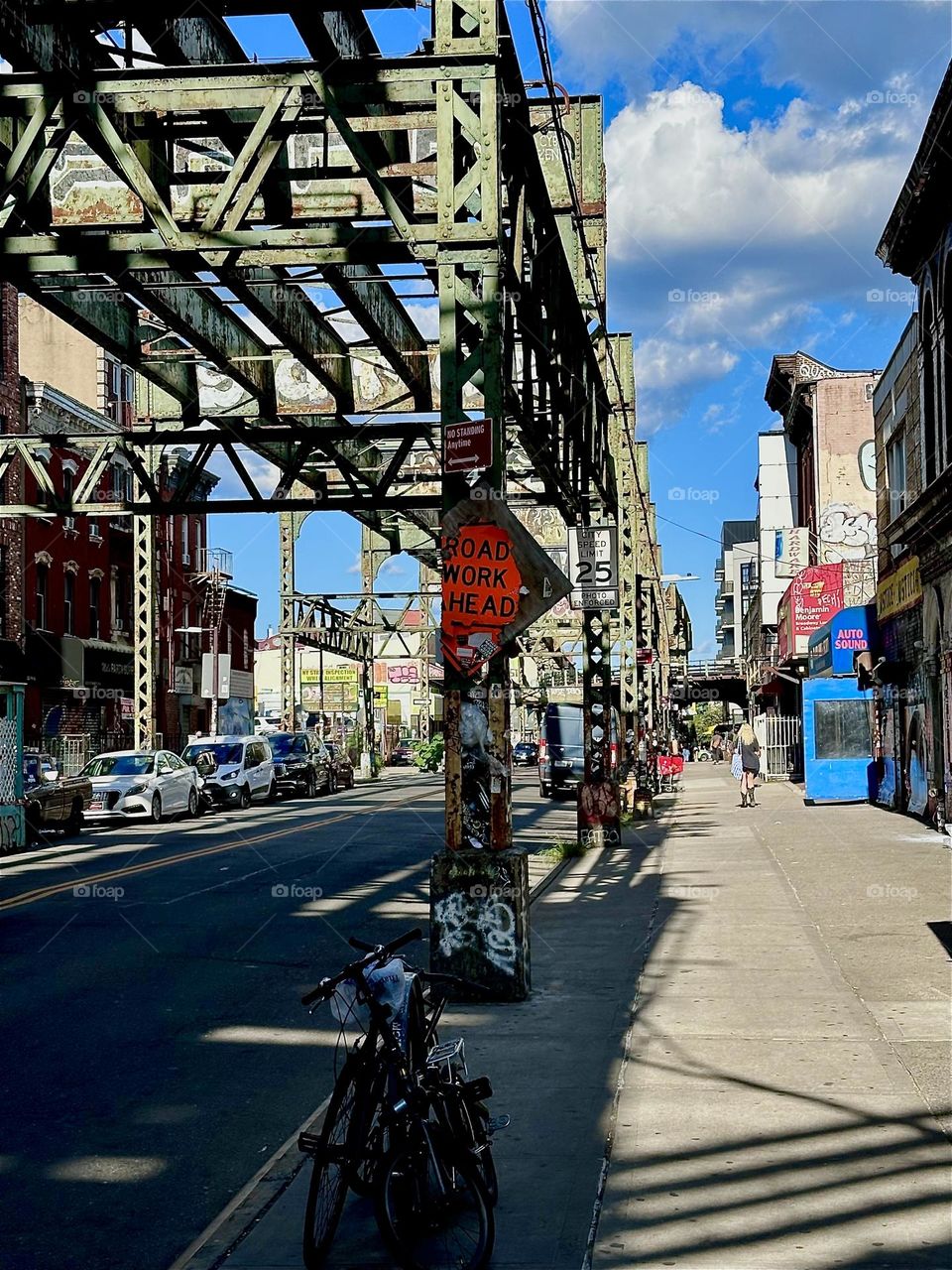 This is the MTA overpass on “Myrtle Ave” near “Broadway” in “Bushwick”, Brooklyn. The gridwork of this marvel of early industrial architecture displays intricate patterns when the setting sun casts shadows upon it. 2024. Hypnotic Productions