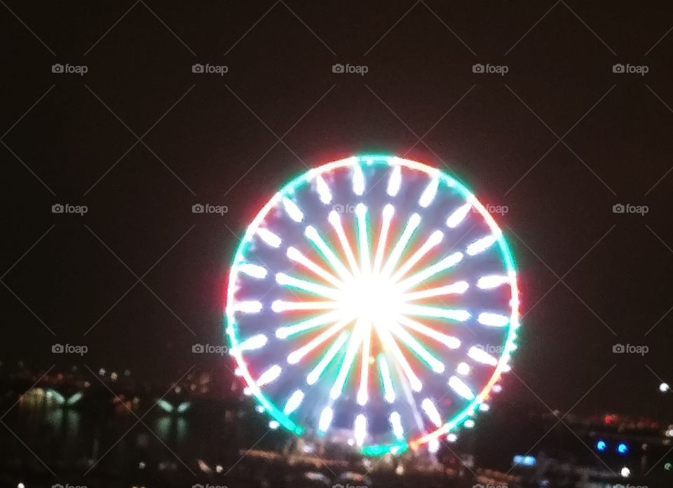 Ferris Wheel Reflecting Colors on the Potomac River