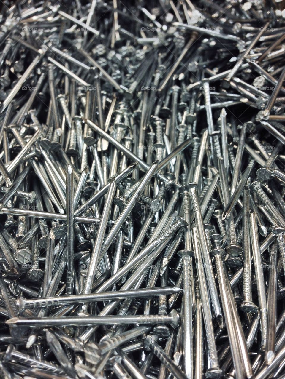 Full frame shot of metal nails