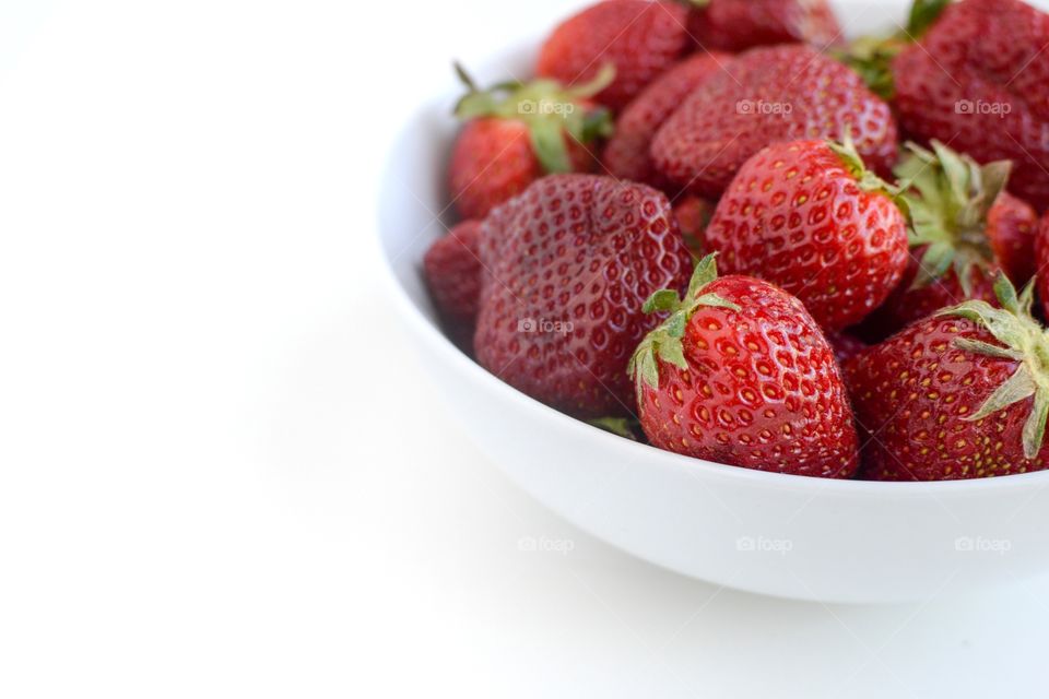 Bowl of Strawberries with a White Background