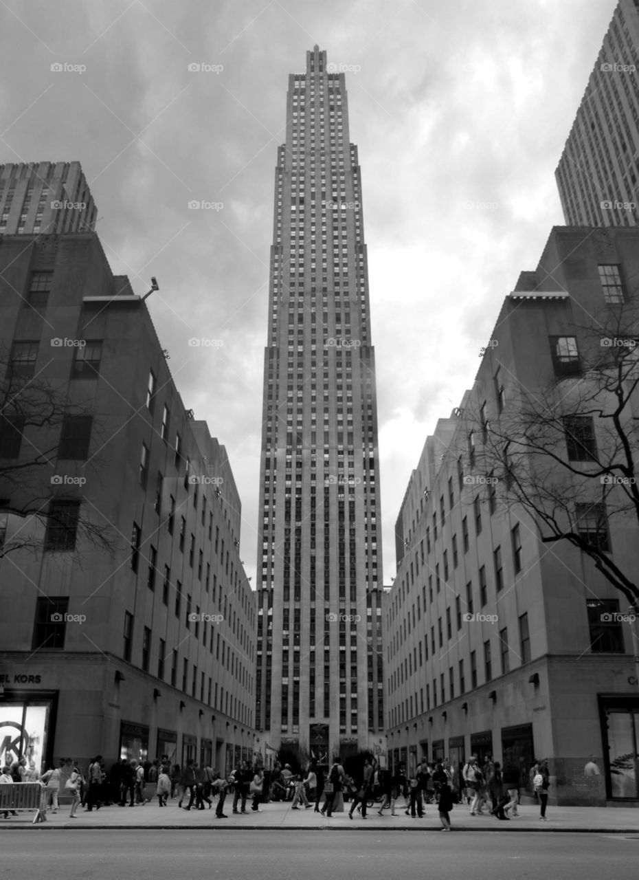 Cloudy at the Rock. Cloudy day vertical panorama of the Rockefeller Center in NYC