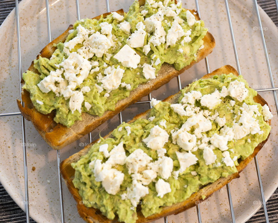 Healthy breakfast - avocado feta toast 