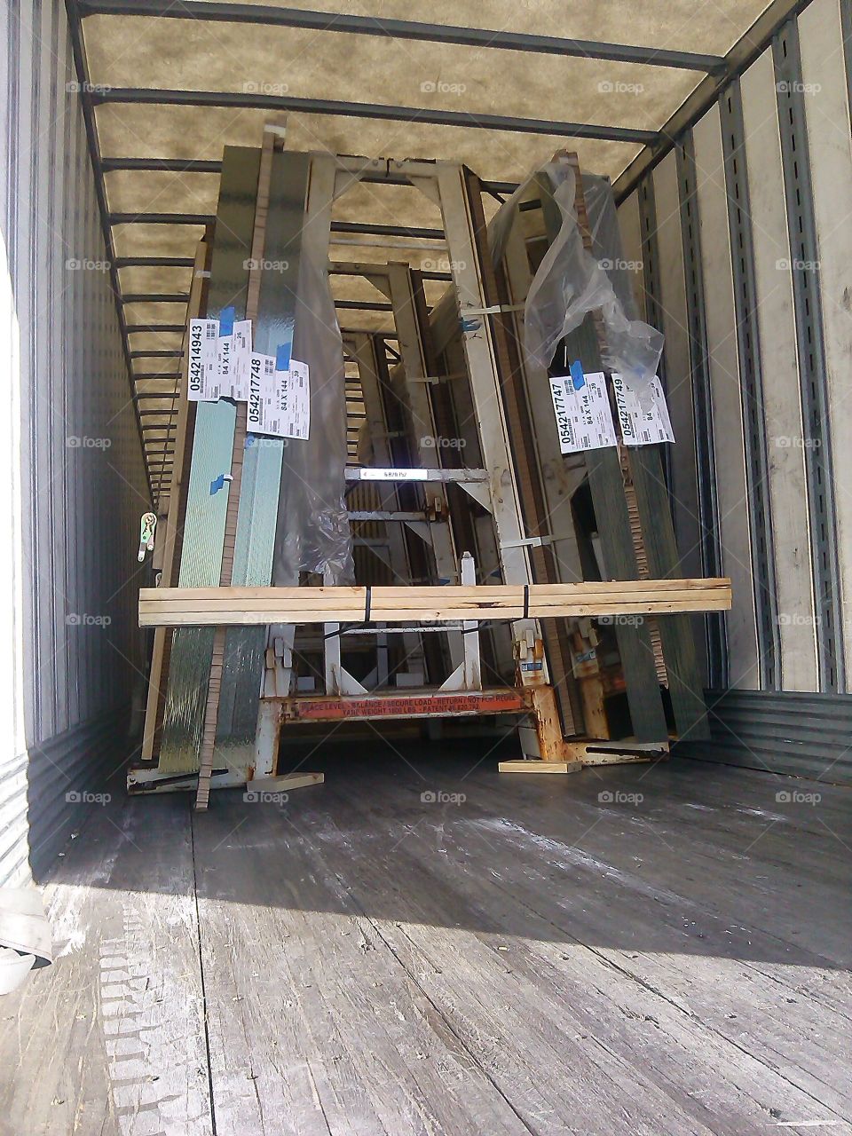 Secure The Load. Large plates of glass are secured for their journey across the country.