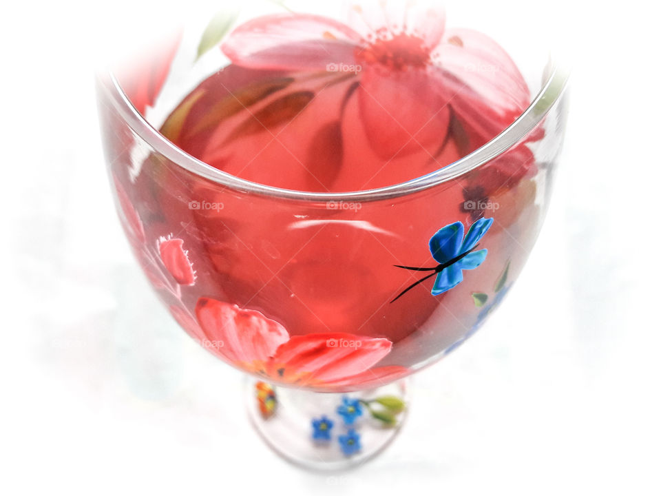 Bright and colorful photograph of a glass of wine.