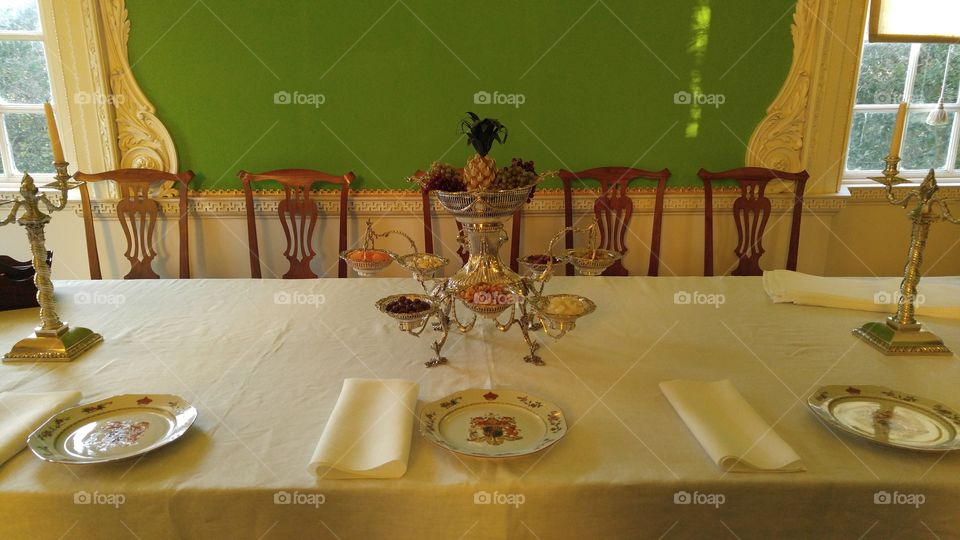 A dining room table display inside the governors home at colonial Williamsburg Virginia