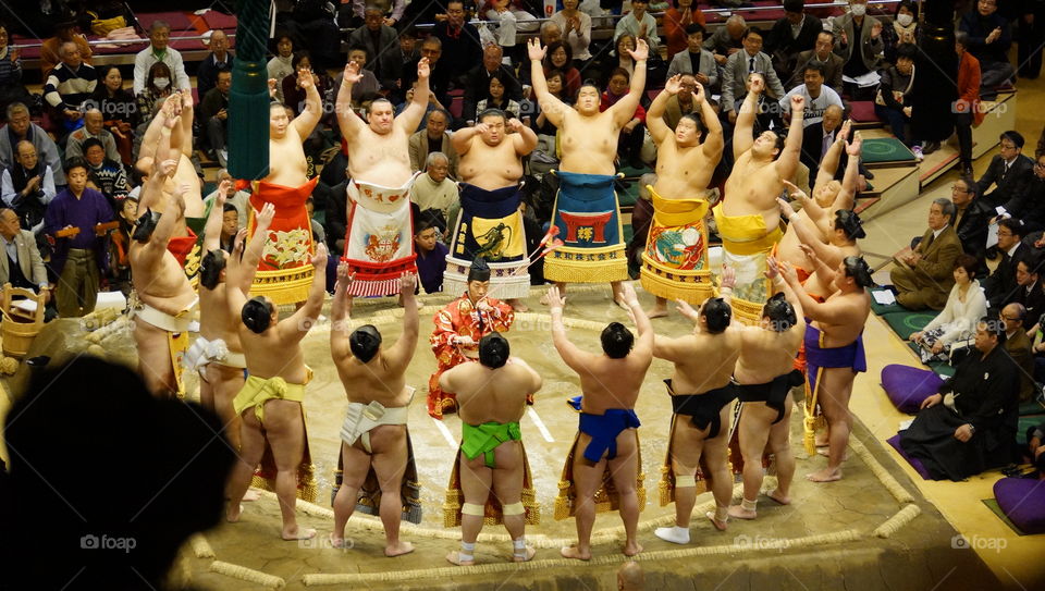Before the upper level matches begin both east and west stables send out their contenders each day during the sumo tournament.