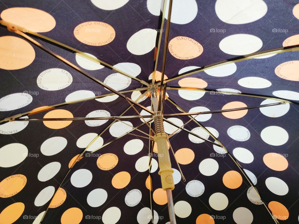rainy days are here again. colorful umbrella out for rain
