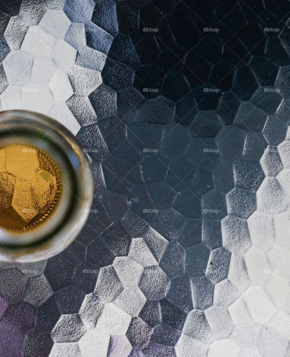 Abstract shape table with bottle