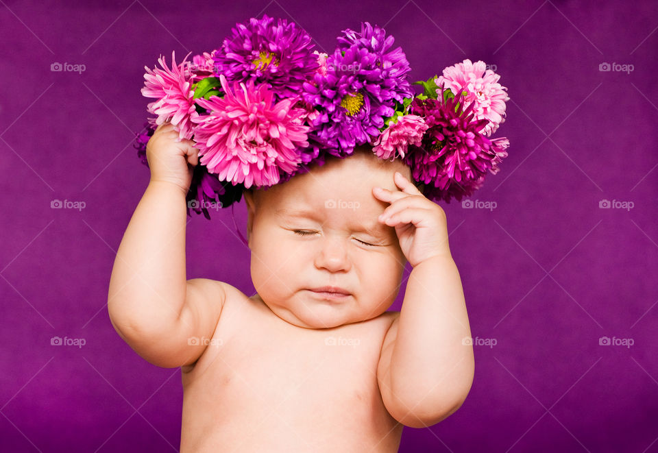 Cute baby with flowers