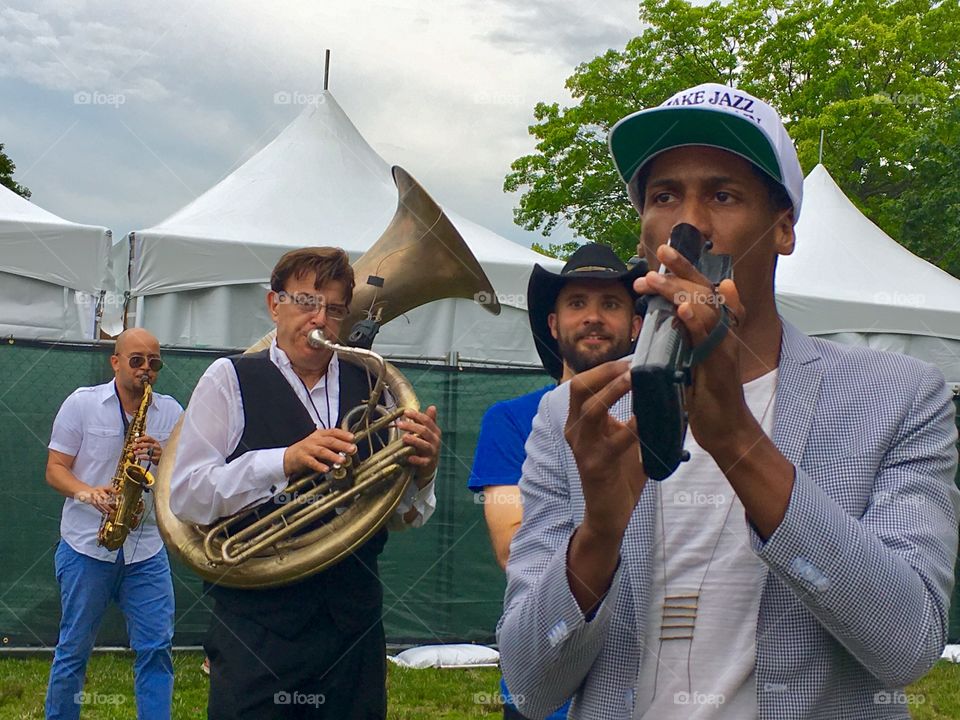 Jon Batiste & Stay Human Band at the Louis Armstrong Festival in Flushing Meadows Park in Queens, New York City in Summer 2017