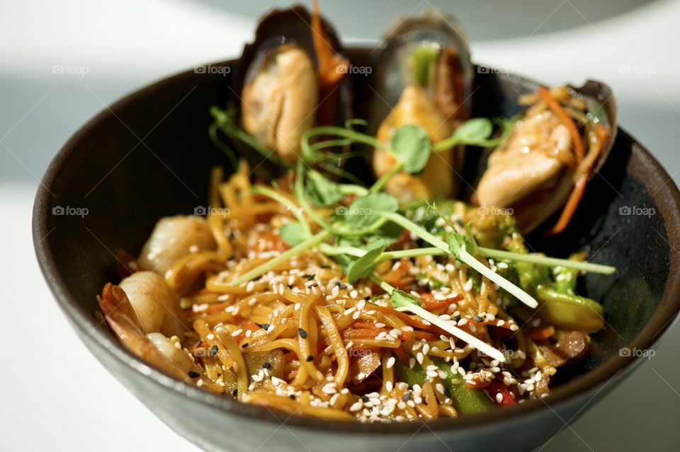 close-up of a plate with Asian cuisine