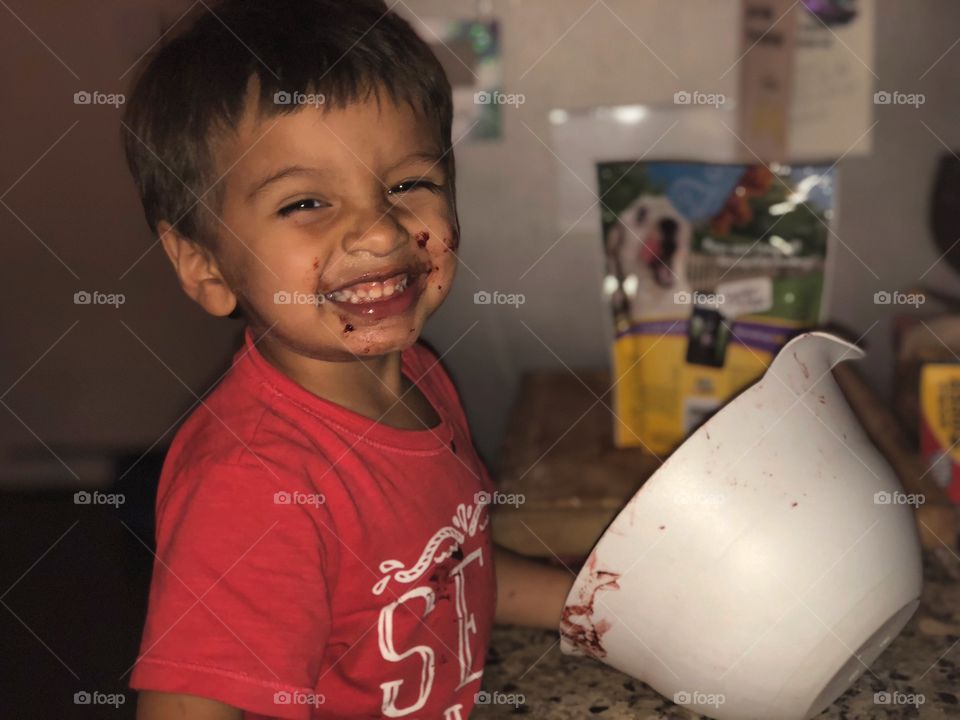 He loves baking with mommy! 
