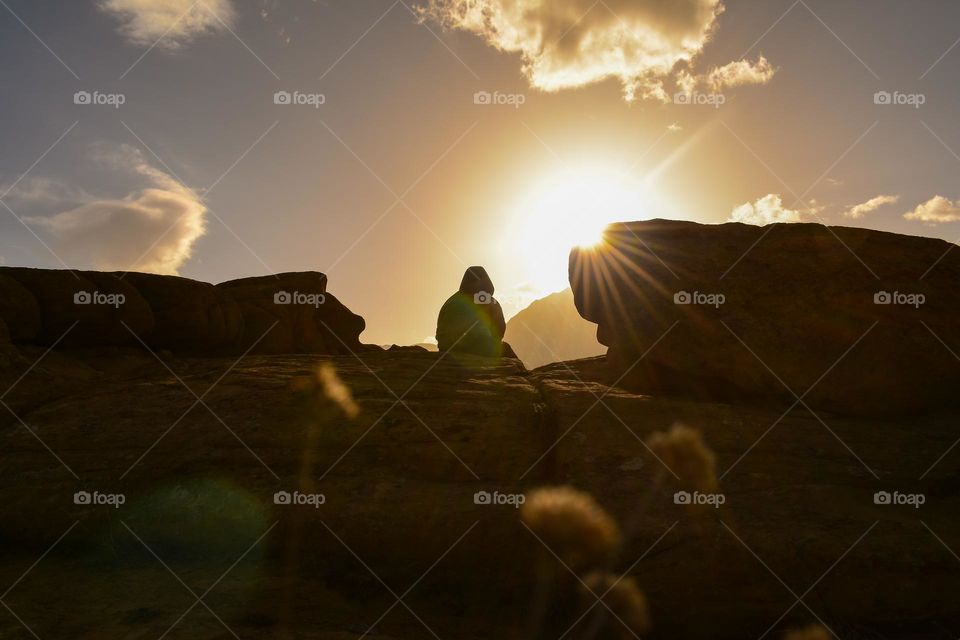 silhouette of a man enjoying the magical mountain landscape