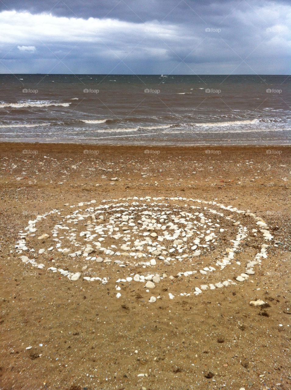 beach sky stones sand by pixiemelton