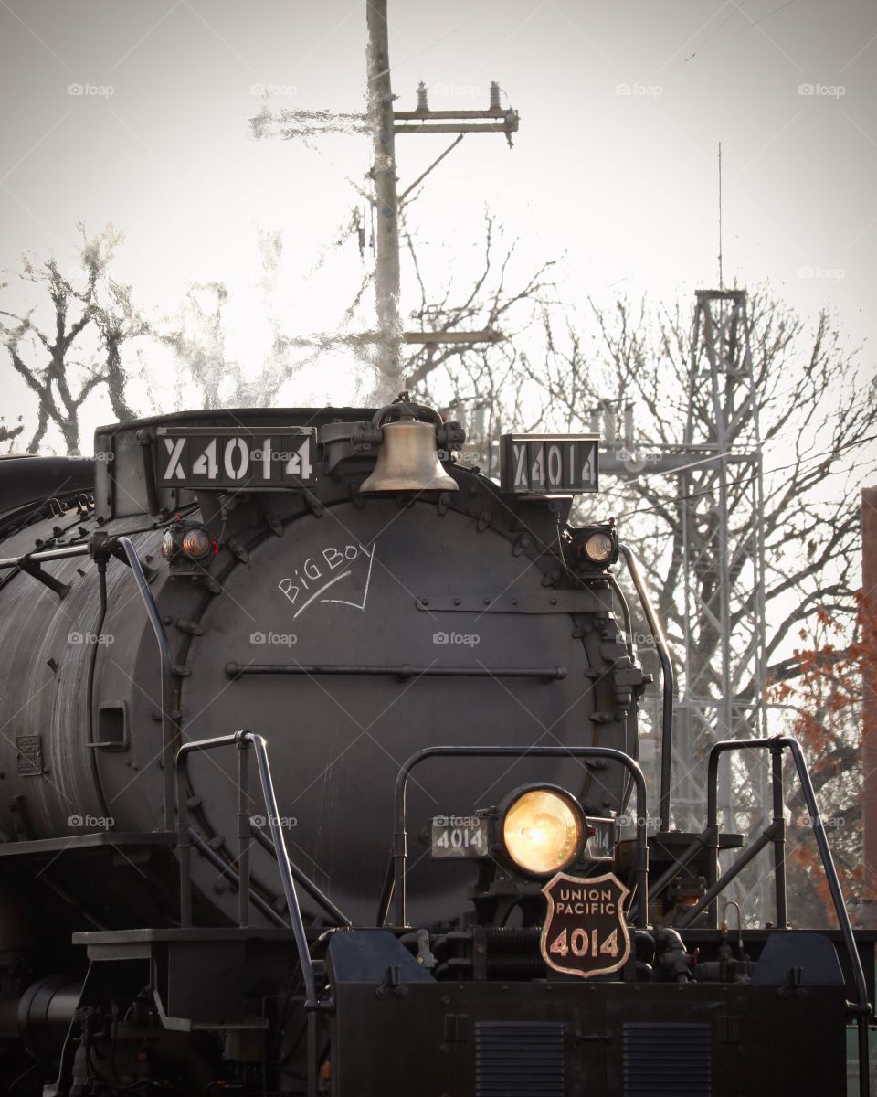 Antique steam engine train at the railroad.