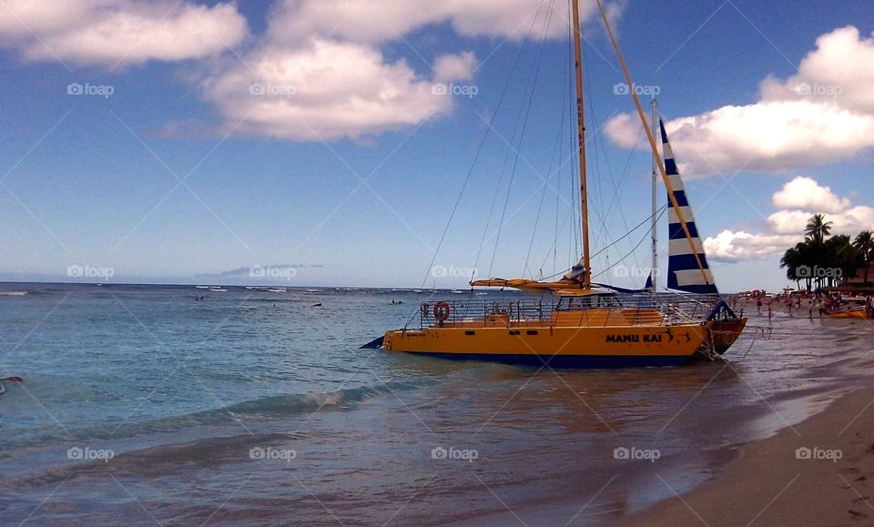 Sailing in Ohau. Catamaran sailing on Waikiki beach Oahu Hawaii   