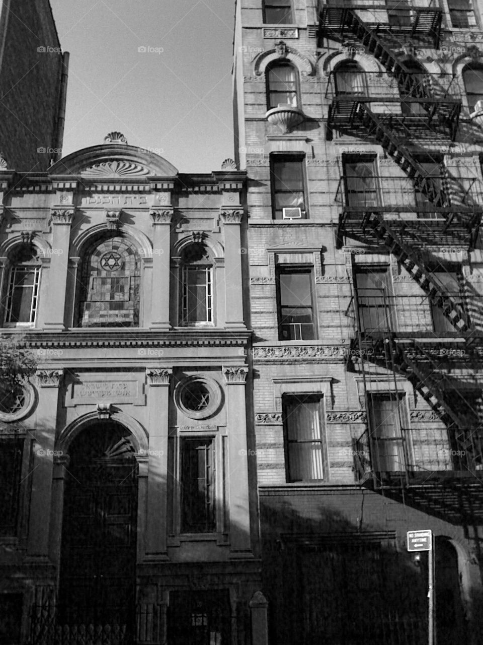 Lower East Side Revery. Synagogue and walk up building on the Lower East Side of Manhattan