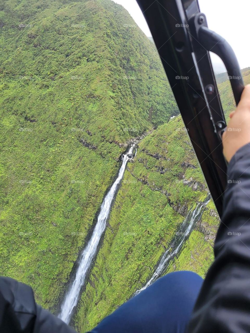 Up in air looking at the waterfall 