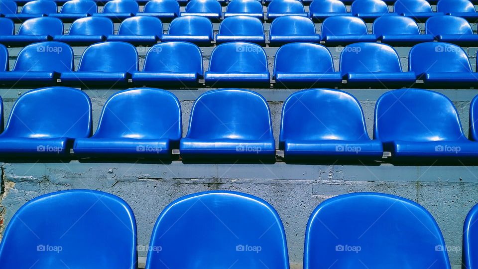 blue seats at the Dynamo stadium in the city of Kiev