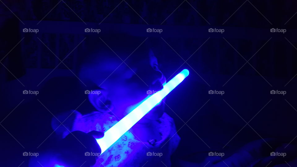 light saber fun. daughter was teething it was night thought she would have fun