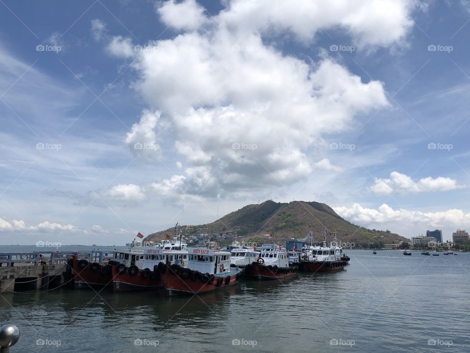Vung Tau beach. In front is the fishing boat of the fishermen here. Sea water and sky create a beautiful scene