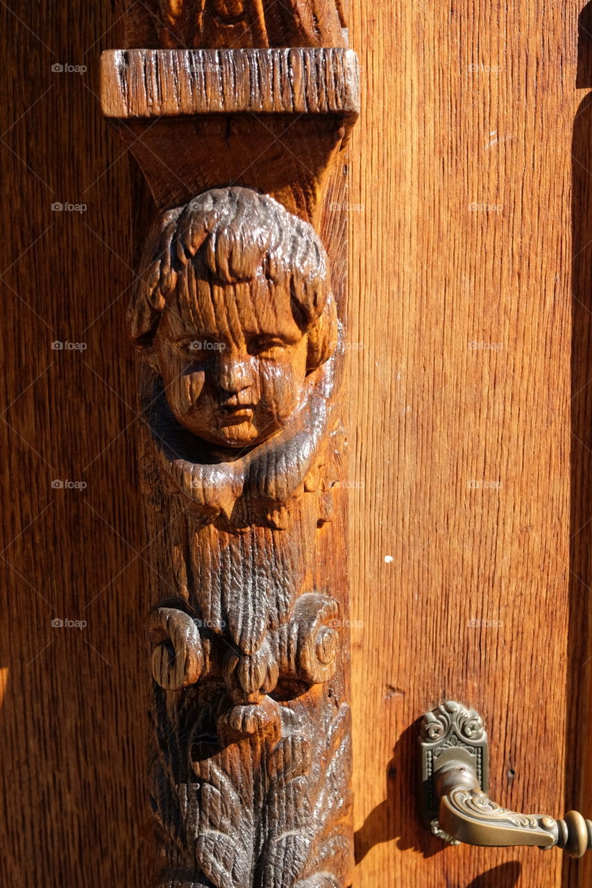 Old carved door in Antwerp