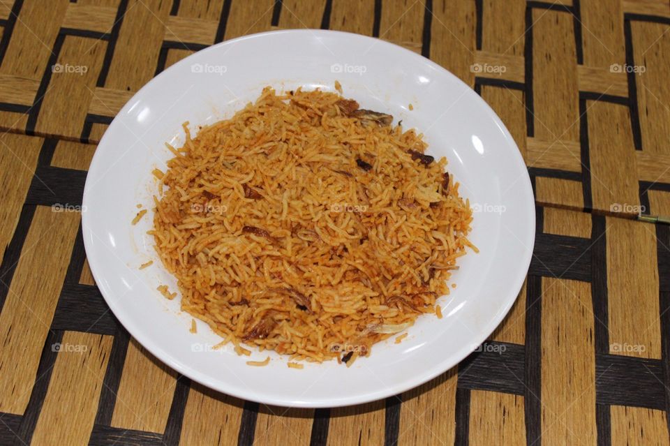Ruz Maqbuz or Maqbuz Rice, Served with all type of meat.