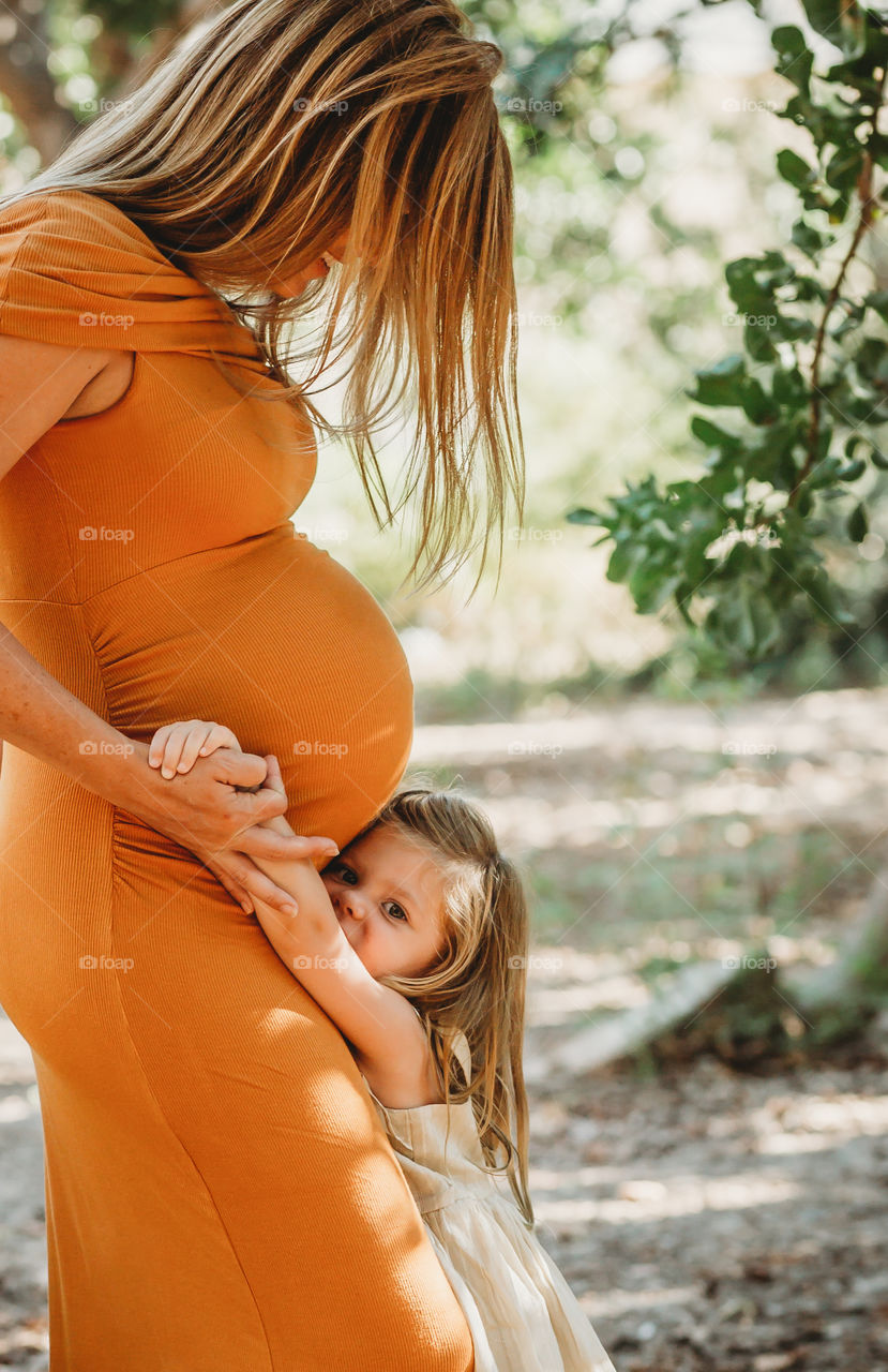 Pregnant mom with child