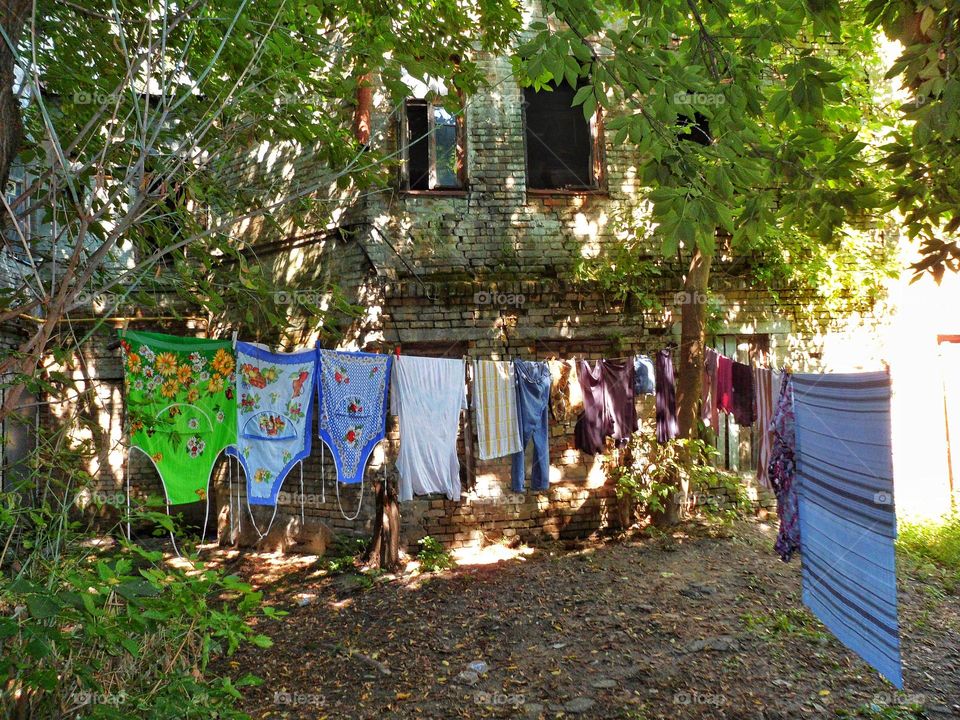 hanging clothes in the courtyard of the old district of the city of Kiev Podil