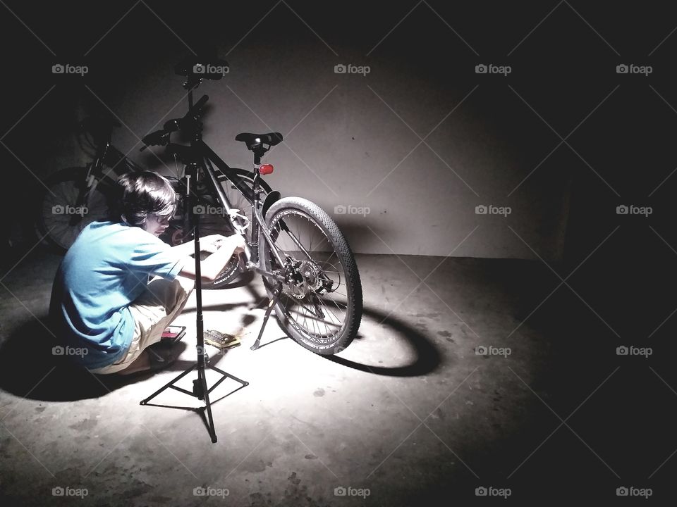My Son Fixing his Bike