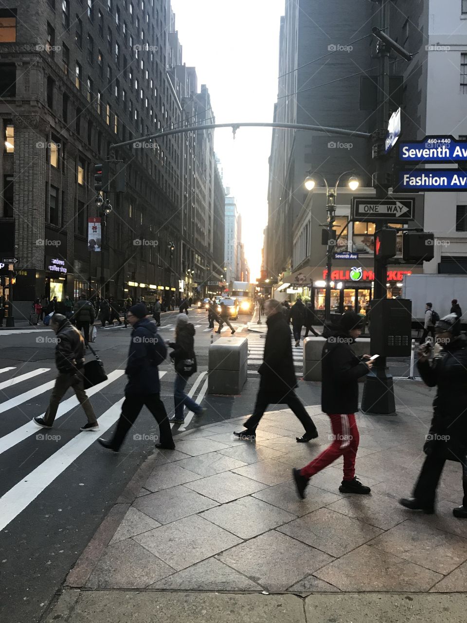 Folks scurrying to work in the early AM, West 35th Street near 7th Avenue.