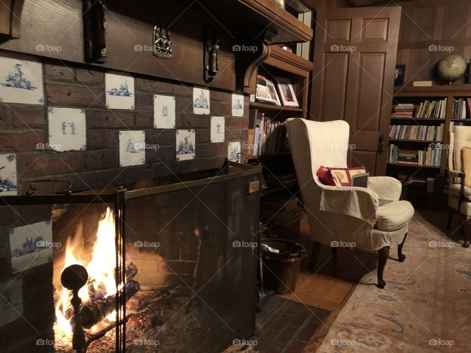 Cost library with fireplace 