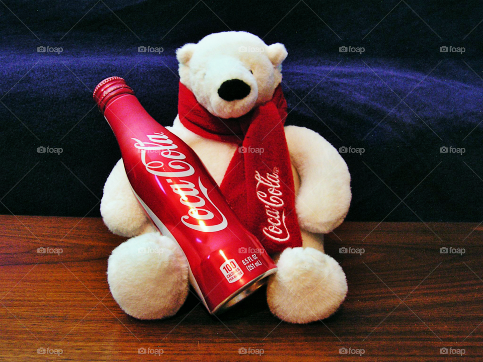 Coke Bear holding bottle of Coke-Cola