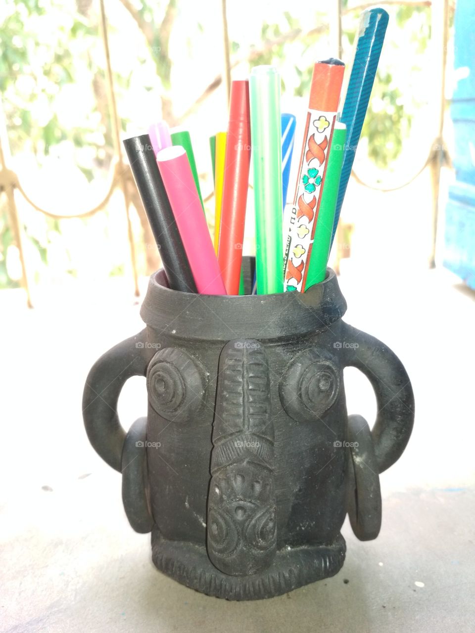 see this with pens....it has many beautiful colour but I think black is made this cup very beautiful...