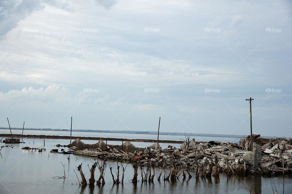Flooded, collapsed and abandoned town