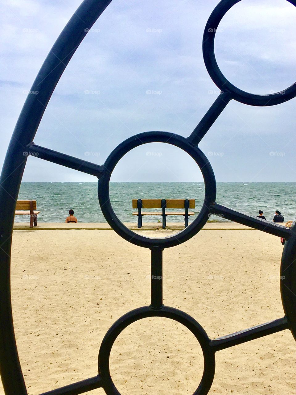 Parker’s River Beach, South Yarmouth, Cape Cod.  View through playground climbing structure.