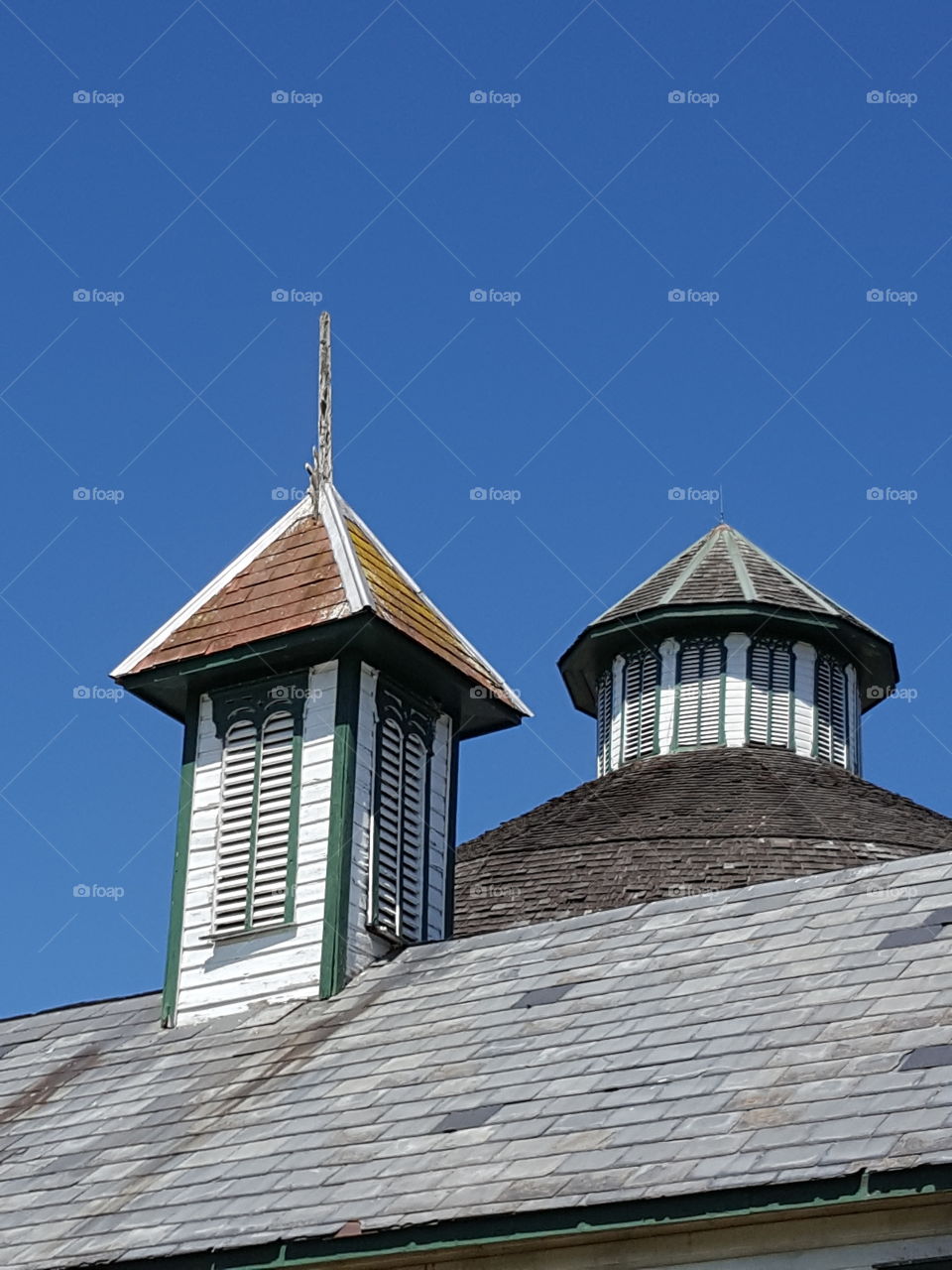 spires atop round barn