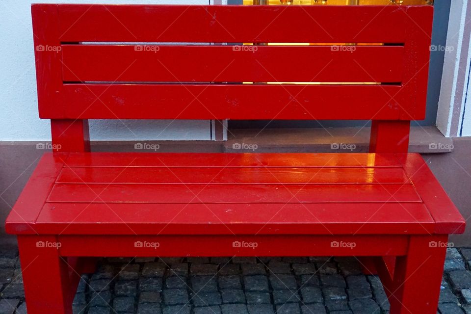 Close-up of red bench