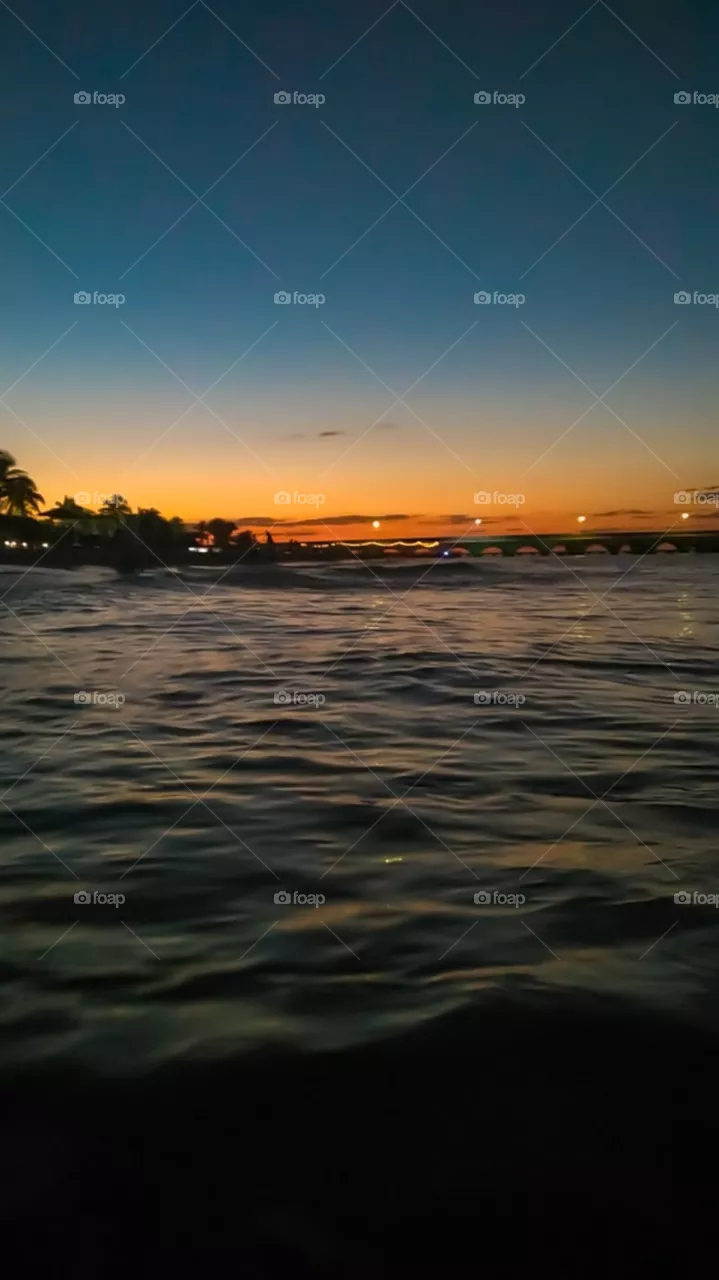 Beautiful blue and orange sunset on the beach